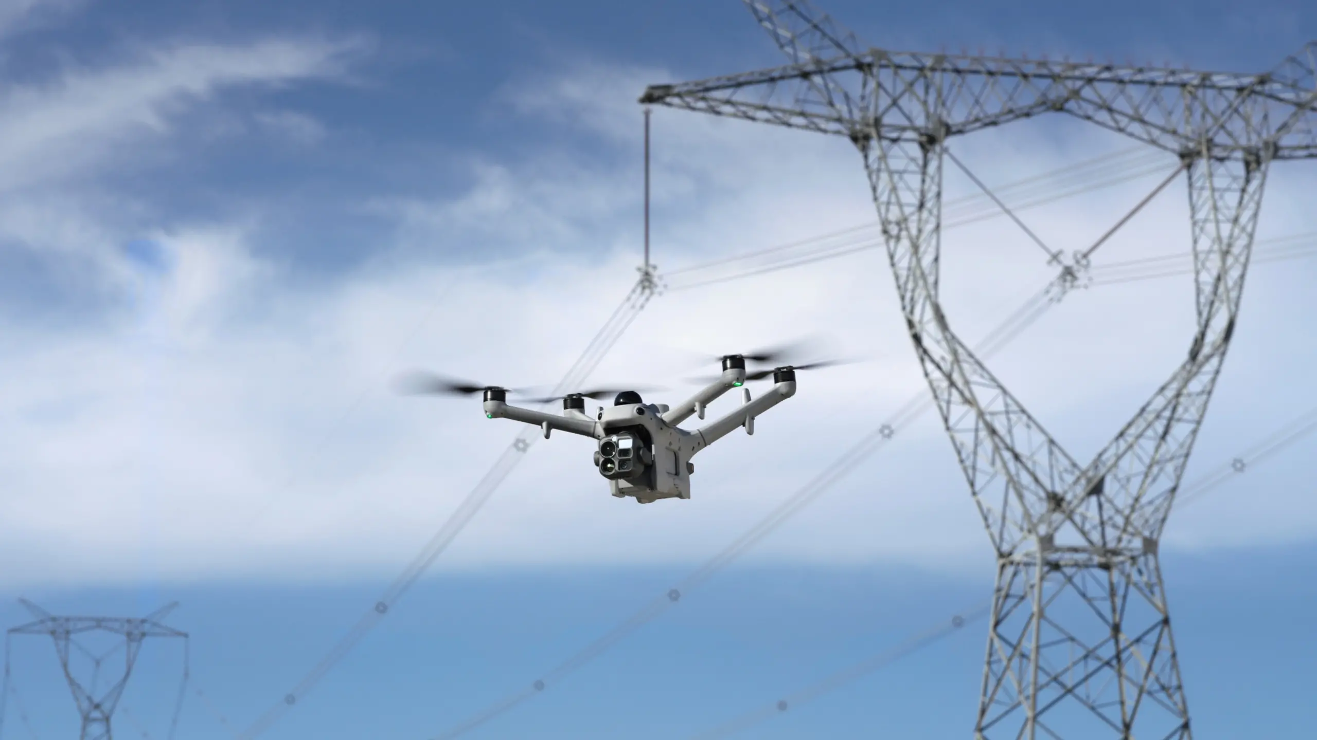 Matrice 5TD inspecting high-voltage transmission lines