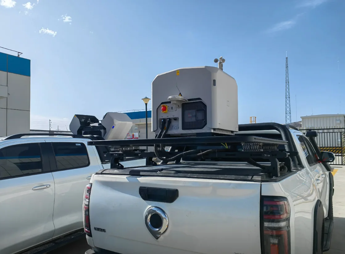 Front view of a vehicle-mounted DJI Dock 3 field installation