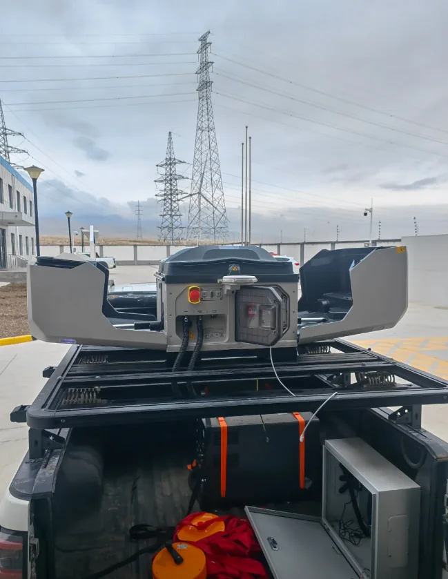 Open DJI Dock 3 prepared on a stationary pickup platform